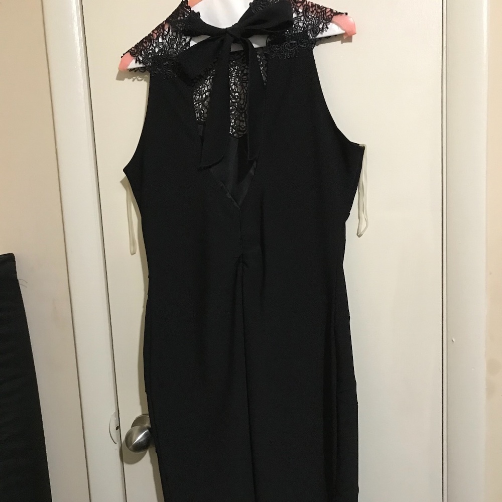 Chic Black Sleeveless Mini Dress with Lace Detail